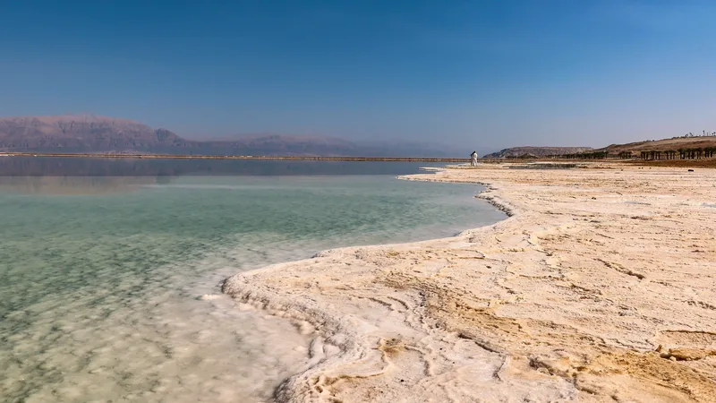 White salt formations along the shore of the Dead Sea