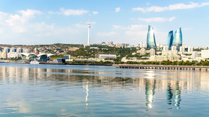 The Flame Towers rising over Baku Bay under a clear sky