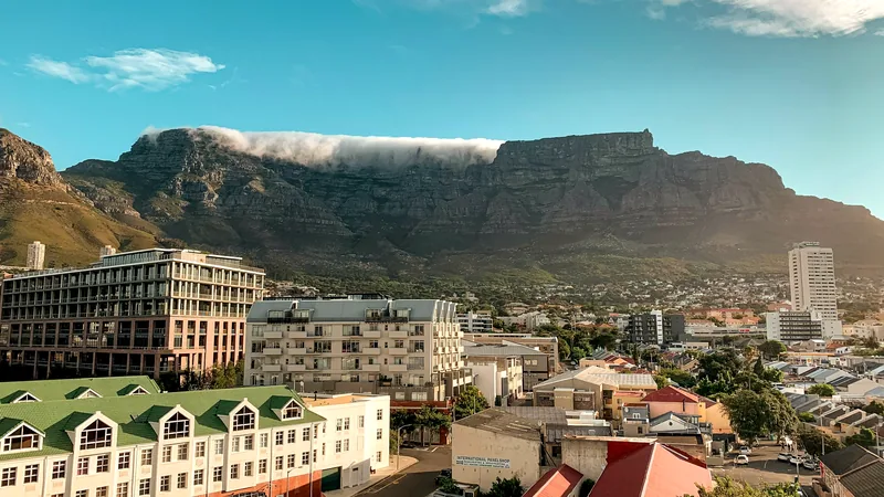 Table Mountain under its cloud above the buildings of Cape Town