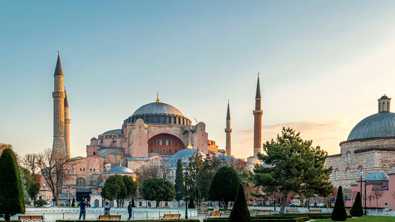The domes and four minarets of Hagia Sophia above the gardens of Sultanahmet