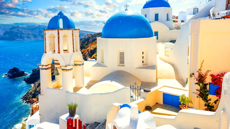 Blue-domed churches above the sea in Oia